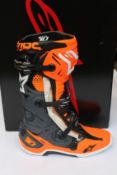 A pair of boxed as new Alpinestars Tech 10 Boots EU 45.5 (Cool grey and fluorescent orange).