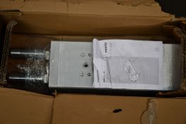 A Festo Semi Rotary Drive (DRRD-63-180-FH-Y9A).