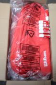 Five Wilson Rackets Bags in red and six Progrip Max 2 fl oz.