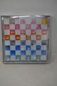 An as new Sunnylife Lucite Chess and Checkers set.