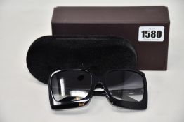 A pair of as new Tom Ford sunglasses.