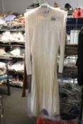 An as new Ralph Lauren Polo turtle neck pleated dress in cream (L).