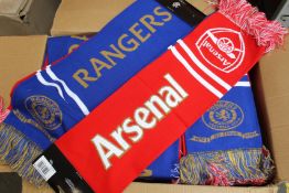 A large quantity of Rangers x Arsenal scarfs.