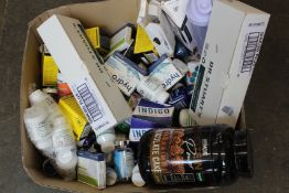 A box of assorted dietary supplements and related items.