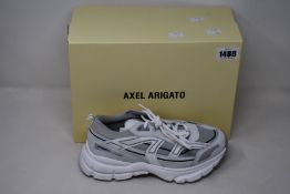 A pair of as new Axel Arigato Marathon Trail trainers (UK 5).