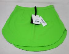 An as new The Attico mini skirt in green (Size 8 - RRP £430).