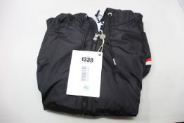 An as new Moncler Grimpeurs shell hooded jacket (TG 5 - RRP £500).