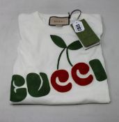 An as new Gucci Cherry Gucci T-shirt (XS).