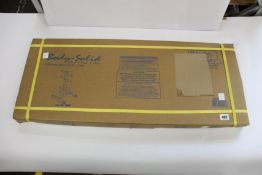 A boxed as new Body-Solid Olympic plate tree and bar holder.