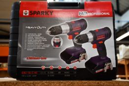 Three boxes of as new Sparky professional heavy duty drill sets (One drill per box).