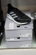 Two pairs of as new Adidas Supernova + M trainers (UK 11).