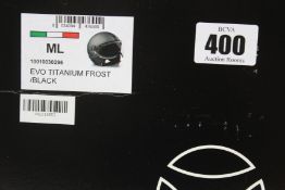 A boxed as new Momo Design EVO Fighter motorcycle helmet in Titanium Frost/Black (ML).