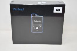 A boxed and sealed as new Medtronic MiniMed 780G tethered insulin pump.