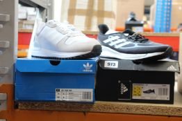 Two pairs of as new Adidas trainers; ZX 700 HD and Supernova + M trainers (Both UK 9).