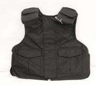 A Safe Guard Armour Patrol 1 tactical armour vest in black, with a detachable 'Public Safety' velcro