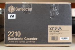 A Safescan 2210 Banknote Counter.