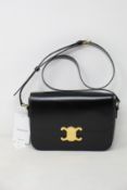 An as new Celine Teen Triomphe bag in shiny calf skin (RRP £2,550).