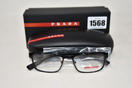 A pair of as new Prada glasses frames.