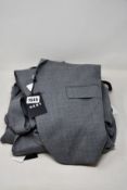 Two as new DKNY suit jackets in grey (Both 38R) together with a pair of matching trousers (32R).