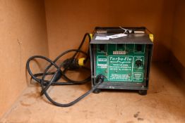 A pre-owned Turbo-Flo Fresh Air Hose Breathing Apparatus.