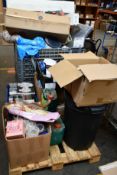 A large pallet crate of miscellaneous items to include body wash, tower fan, records, desk chair and