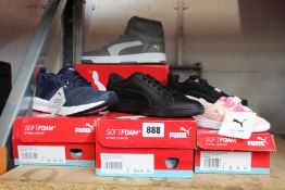 Five pairs of children's/juniors assorted as new Puma trainers.
