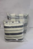 Two Ian Mankin Hemsby large checked cushions (RRP: £65) and two Ian Mankin Tenby small stripe