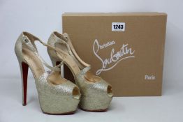 A pair of pre-owned Christian Louboutin Exagona 160 glitter mini shoes (EU 38.5 - Good condition,