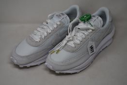 A pair of as new Sacai X Nike LD Waffle white with authentication tag (UK 10 - No box).