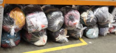 Twelve bags of pre-owned clothing and related items.