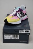 A pair of women's as new New Balance 327 trainers (UK 4).