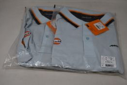 An as new McLaren Gulf Classic polo shirt (XL - RRP £57) and a McLaren Gulf Racing Stripe hooded