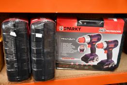 Three boxes of as new Sparky professional heavy duty drill sets.