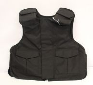 A Safe Guard Armour Patrol 1 tactical armour vest in black, with a detachable 'Public Safety' velcro
