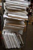 A quantity of adhesive canvas frames (Various sizes) (Approximately 55 items).