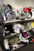 A quantity of assorted as new clothing and related items.