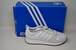 Two pairs of as new Adidas ZX 700 HD trainers (UK 10.5).