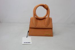 An as new Jacquemus Le Chiquito Nord bag in orange (RRP £490).