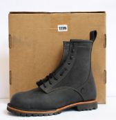 A pair of as new Origin boots (US 13).