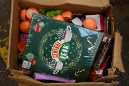 A box of as new toys/games to include playing cards, The Peach Snaps card games and The Doodle