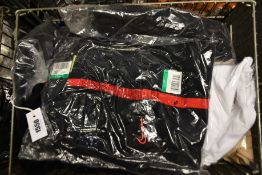 A quantity of as new Nike sportswear and accessories.