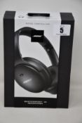 A pair of boxed as new Bose QuietComfort 45 noise cancelling headphones.