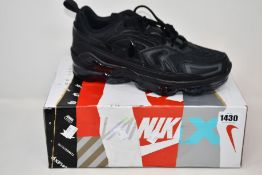 A pair of as new Nike Air Vapormax Evo triple black (UK 11).
