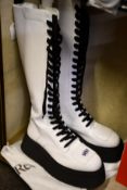 A pair of pre-owned GCDS contrast sole knee boots in white (EU 39 - Good condition).