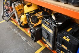 Three pre-owned DeWalt wet/dry vacuum/hoovers, three DeWalt tool cases, a DeWalt area light/charger,