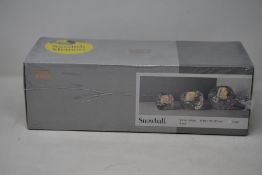 A boxed as new Kosta Boda Snowball Votive Holder Set (3 pcs H 60/70/90mm).