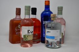 A bottle of James gin (JG.01) (700ml), a bottle of Larios 12 Premium gin (700ml), a bottle of