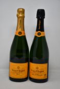 A bottle of Veuve Clicquot Brut champagne (750ml) and three bottles of Veuve Cliquot Cuvee Saint-