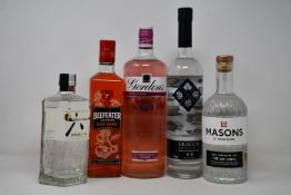 A bottle of Gordon Premium Pink gin (1ltr), a bottle of Brecon Botanicals gin (700ml), a bottle of