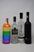 Three bottles of Absolut vodka (1ltr), a bottle of Five vodka (700ml), a bottle of Chase vodka (
